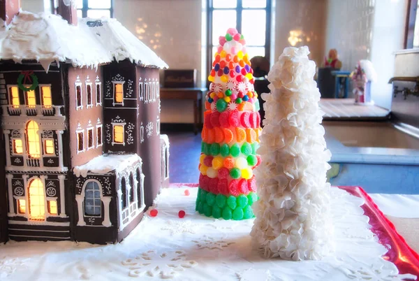 A gingerbread house inside a kitchen of a mansion at Christmas time in newport rhode island.