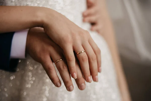 Declaration of love, offer of hand and heart. Wedding rings on hands