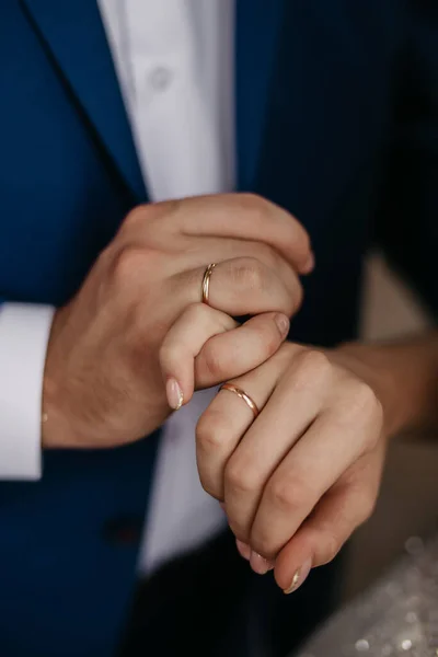 Declaration of love, offer of hand and heart. Wedding rings on hands