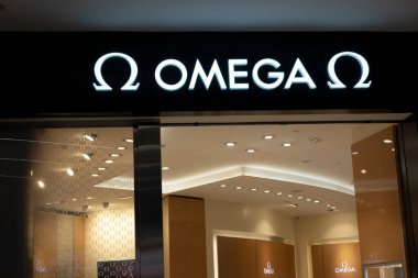 Fiumicino, Italy - October 30, 2021: Omega SA Swiss luxury watchmaker store inside the Leonardo da Vinci International Airport clipart