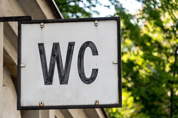 Sign of a public water closet or flush toilet, wc