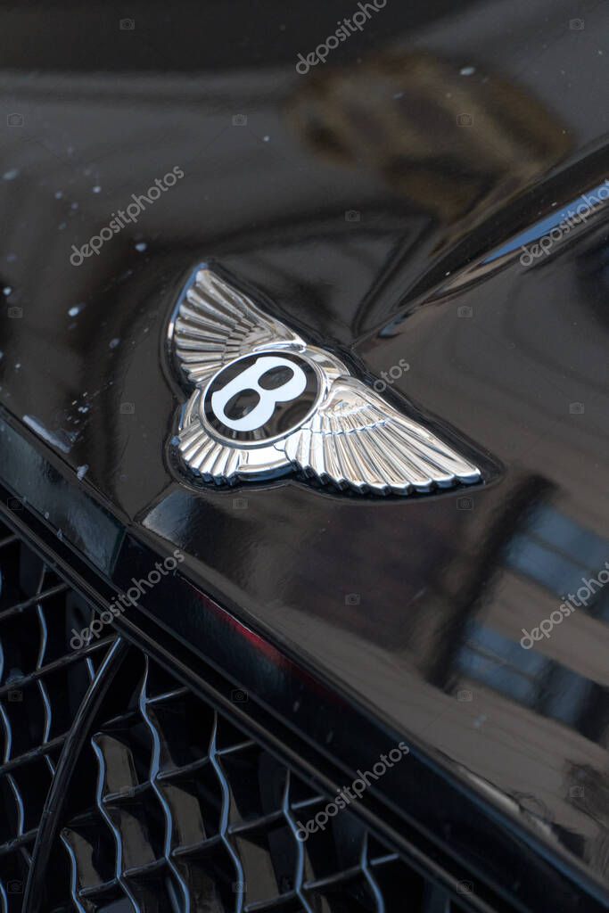 Prague, Czech Republic - July 22, 2020: Bentley car emblem. Bentley Motors Limited is a British company that designs, develops, and manufactures luxury motorcars which are largely hand-built