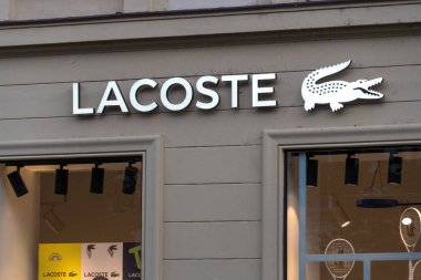 Prague, Czech Republic - July 22, 2020: Lacoste shop, French clothing company founded in 1933 by tennis player Rene Lacoste and Andre Gillier selling high-end clothing, footwear and famous polo