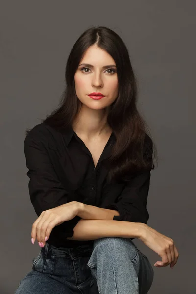 Woman Sitting Chair Her Arms Crossed Studio Portrait Young Brunette Royalty Free Stock Photos