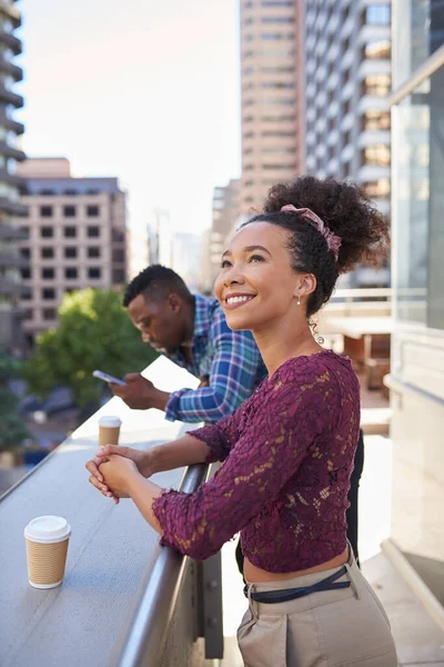 Young Woman Smiles Looks View Her Coffee Break City High — Stockfoto