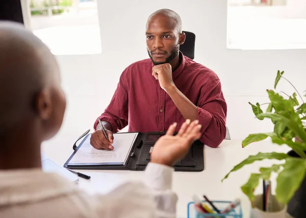 Black Man Listens Takes Notes While Client Speaks High Quality — Stock Photo, Image