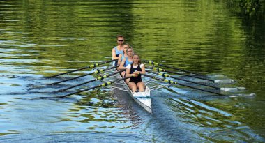 ST NEOTS, CAMBRIDGESHIRE, ENGLAND - JULY 04, 2022: Sculling four on the river Ouse Cambridgeshire. 