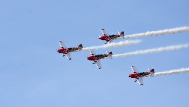 LITTLE GRANSDEN, CAMBRIDGESHIRE, ENGLAND - AUGUST 28, 2022:  The Global Stars aerobatic team flying in formation.
