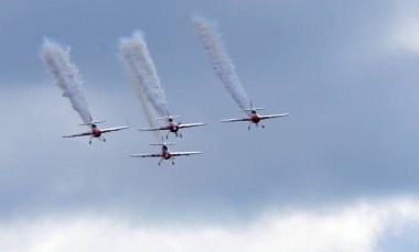 LITTLE GRANSDEN, CAMBRIDGESHIRE, ENGLAND - AUGUST 28, 2022: The Global Stars aerobatic team flying in formation.