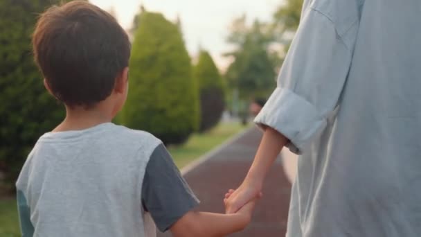 Back View Preschooler Holding Moms Hand Walking Alley High Quality — Vídeos de Stock