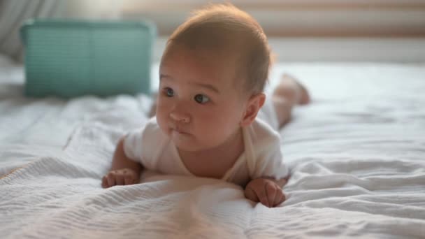 Happy Baby Lying Tummy Bed High Quality Footage — Stockvideo