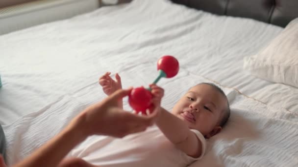 Mother Gives Toy Baby Infant Child Takes Toy High Quality — Αρχείο Βίντεο