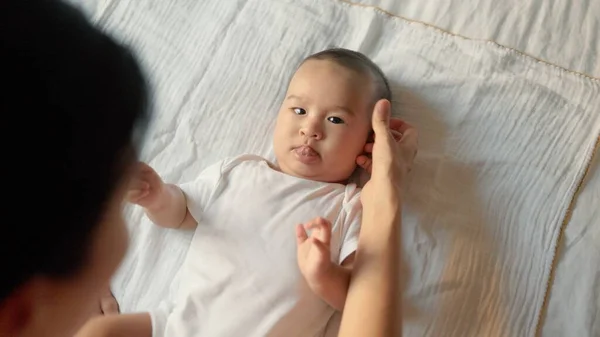 Top View Mother Stroking Her Baby Baby Lying Bed High — Photo