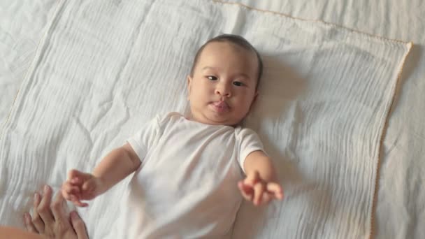 Top View Mother Stroking Her Baby Baby Lying Bed High — 图库视频影像