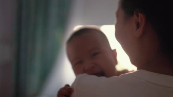 Side View Mother Holds Her Baby Close View Cute Baby — Vídeo de Stock