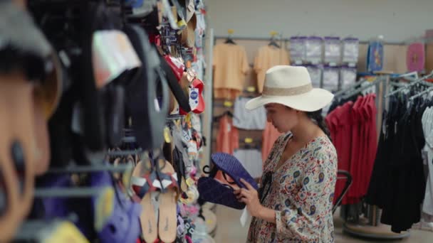 Woman Looking Flip Flops Supermarket High Quality Footage — 图库视频影像