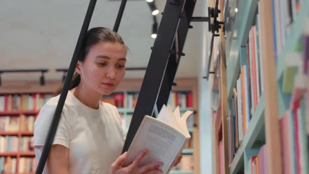 Young Woman Leafing Book Library University Public Library Office Bookshelves — Video Stock