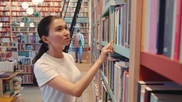 Young Woman Leafing Book Library University Public Library Office Bookshelves — Stockvideo