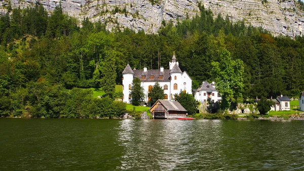 stock image A castle in Obertraun, viewed from Hallstatt lake