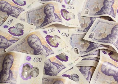 Yeni plastik İngiliz poundu, yakın plan.