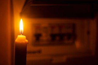 candle and electrical switches, electricity cut-off