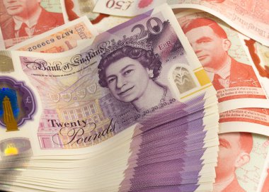 Yeni plastik İngiliz sterlini, yakın plan, nakit.