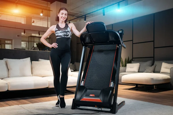 Female athlete prepare for training with treadmill — Stock Fotó