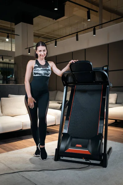 Athletic Woman Staying Assembled Treadmill Home — Stock Fotó