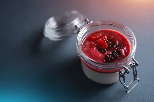 stock image closeup of sweet creamy dessert or mousse with strawberry on dark background