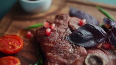 delicious tenderloin fillet meat lamb steak with sweet sauce and green