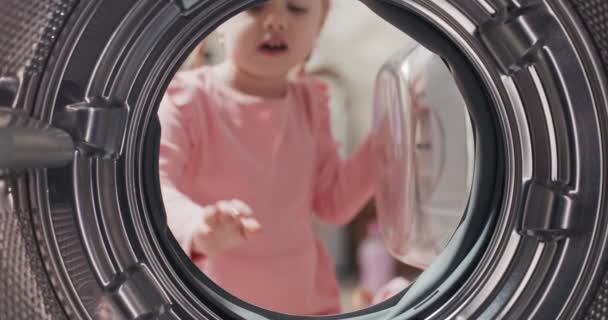 Cute Little Girl Looks Drum Washing Machine Clean New Fresh — Stockvideo