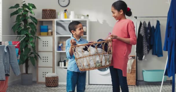 Siblings Stand Middle Laundry Room Holding Bowl Clothes Washing Machine — Stock Video