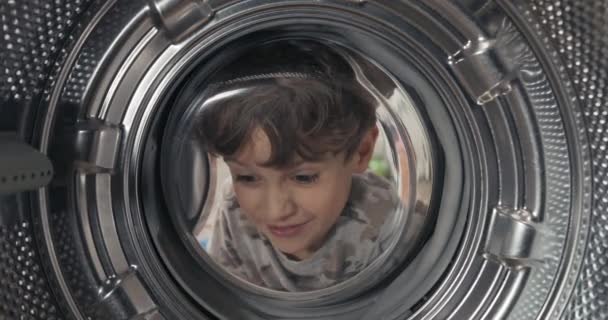 Little Boy Smiling Dark Eyes Doing Laundry View Child Drum — 图库视频影像