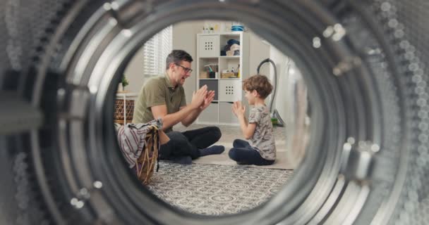 View Washing Machine Drum Bathroom Son Father Sitting Floor Playing — Stockvideo