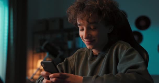 Smart Boy Looking Answers Test Phone Has Remote Lessons Laptop — Vídeos de Stock