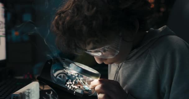 Boy Sitting Desk Front Soldering Iron Repairing Computer Hardware Engineering — Video