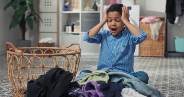 Child Dark Hair Sits Laundry Room Floor Bathroom Terrified Boy — Stock video