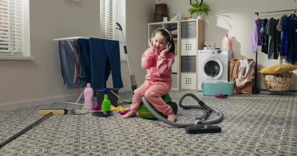 Little Girl Dressed Homemade Clothes Sits Vacuum Cleaner Resting Cleaning — 图库视频影像