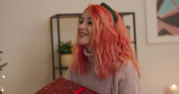 Christmas Eve Girl Red Curly Hair Received Large Gift Wrapped — Stockvideo