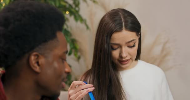 Attractive Brunette Girl Sitting Couch Holding Christmas Present Beauty Shook — Wideo stockowe