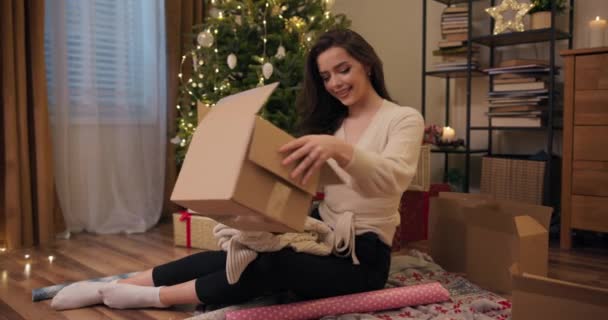 Eve Christmas Young Brunette Good Mood Packs Gifts Family Girl — Stock Video