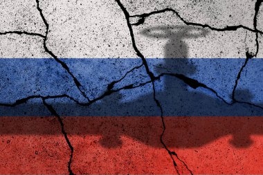 Rusya bayrağı beton bir duvara gaz borusu gölgesiyle boyanmış. AB ile Rusya arasındaki ilişki