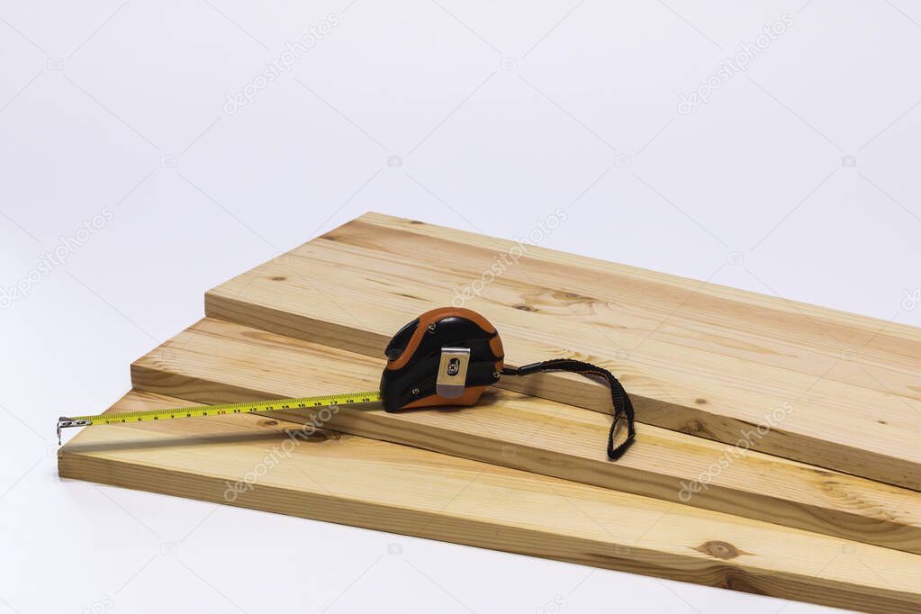 Wooden boards and a measuring ruler.