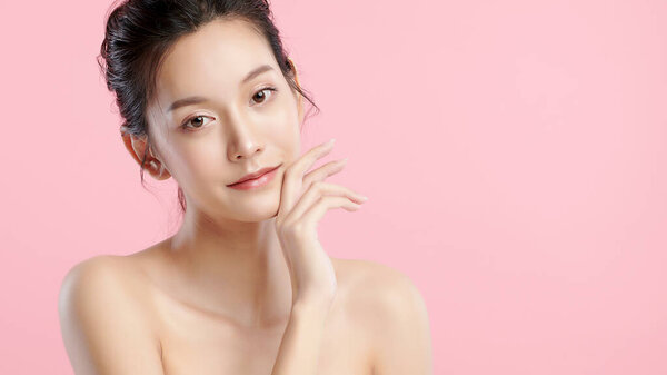 Beautiful Young Asian Woman Clean Fresh Skin Pink Background Face Royalty Free Stock Images