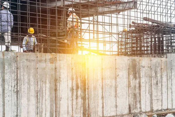 Unrecognizable workers working on the construction of a bridge in the northern caribbean of Nicaragua