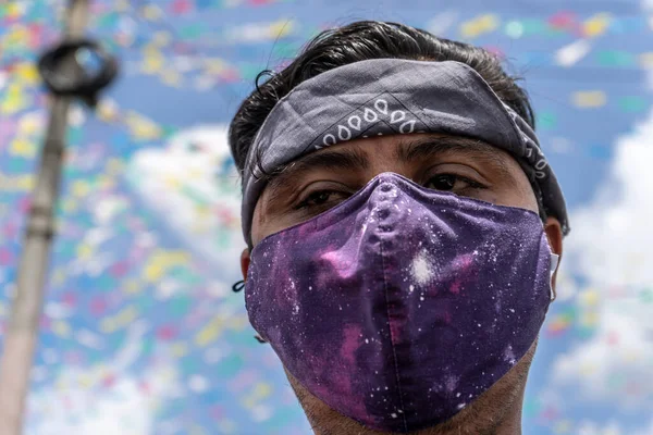Promising man participating in the religious celebration of Santo Domingo in Managua Nicaragua