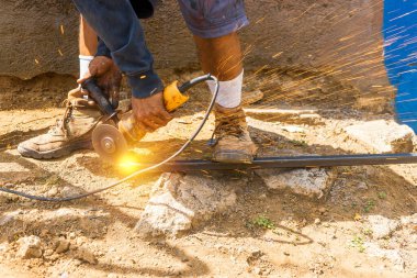Latino blue collar worker working outdoors in Latin America