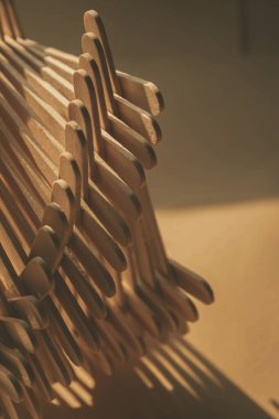 close up shot of a row of wood sticks