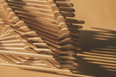 close up shot of a row of wood sticks