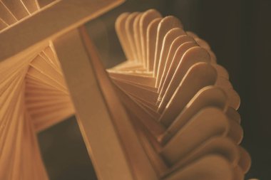 close up shot of a row of wood sticks